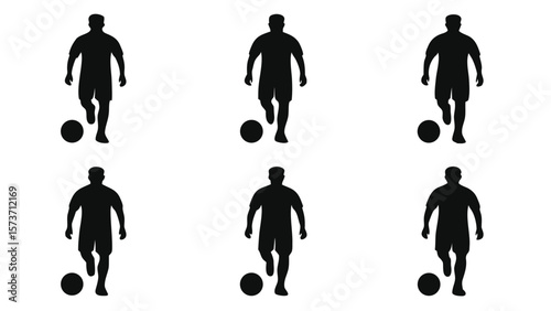 Black silhouette of soccer players kicking ball football