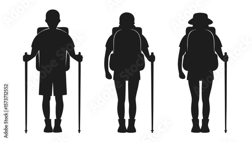Hikers with backpacks and poles trekking walking