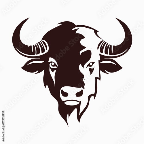 Silhouette of a buffalo's head, taken from the side, highlighting its massive horns curving outwards, with a thick, strong