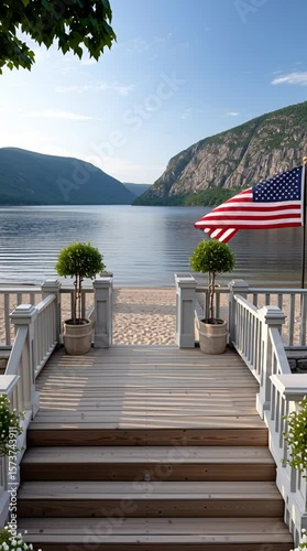 Wooden patio with potted plants leading to a sandy beach by a calm lake, mountains in the background, and an American flag waving. Peaceful outdoor scene and national pride concept