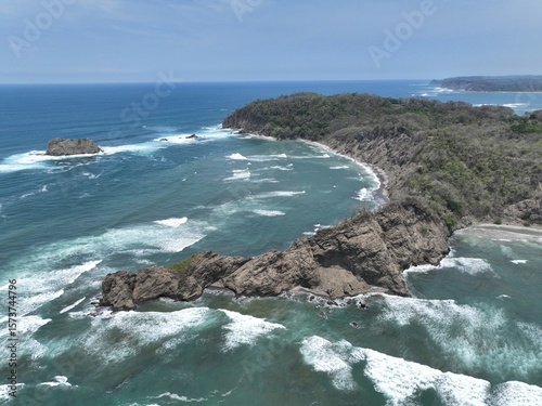 Samara, Costa Rica coast: waves breaking on rocks