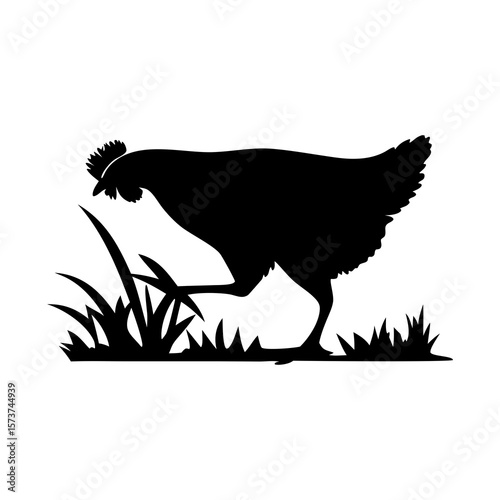 Black silhouette of a fluffy chick pecking at the ground on a white background