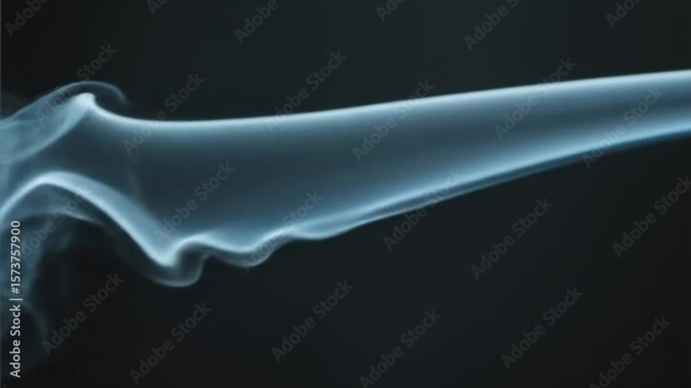 Smoke background with blue-tinted tendrils twisting upward in slow motion, producing a mysterious look suitable for sci-fi intros, tech videos, or magical elements in editing.