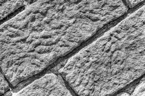 Beautiful stone wall background in black and white close up view