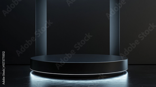 A blank, round metal object on an empty stage with a spotlight, isolated on black
