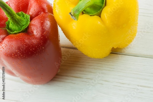 Fresh bell peppers on chopping board