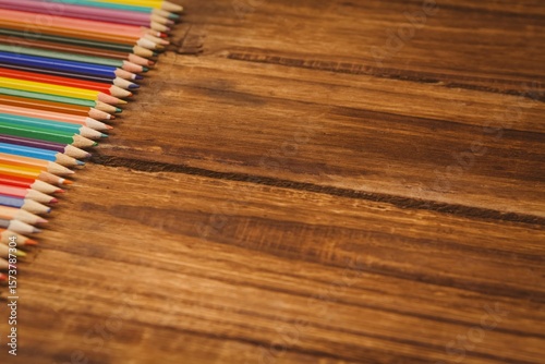 Color pencils on wooden table