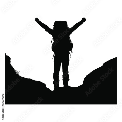 Hiker with arms raised in triumph on mountain peak silhouette