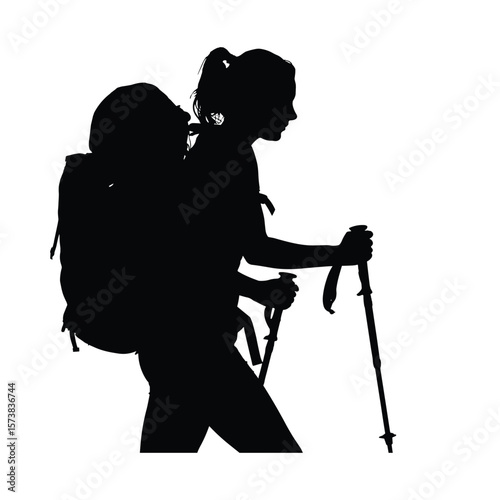 Woman hiker with backpack and trekking poles walking silhouette