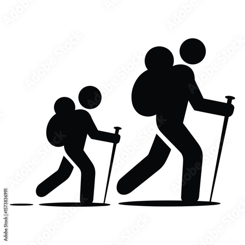 Two hikers with backpacks and trekking poles walking together silhouette