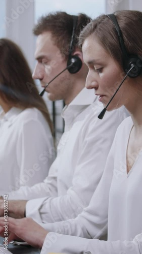 Dedicated Call Center Professionals Collaborating Effectively with Headsets for Enhanced Service