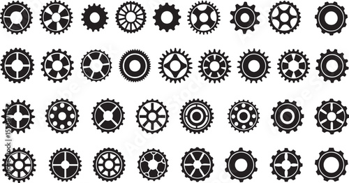 Collection of various gear wheels on white background