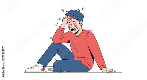 Distressed young man experiencing severe headache and physical discomfort sitting on the floor with eyes closed clutching his forehead in agony and pain
