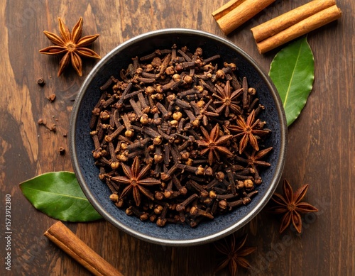 Assorted Spices in Bowl with Cinnamon, Cloves, and Star Anise
