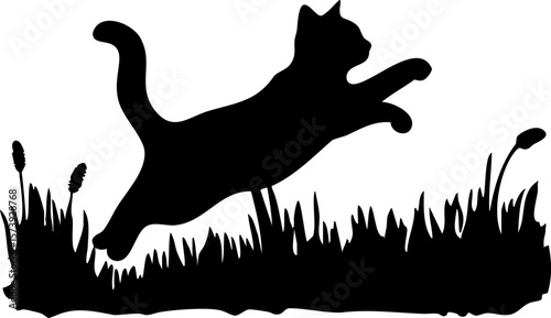 Cat jumping silhouette in grass with plants and reeds in outdoor nature scene