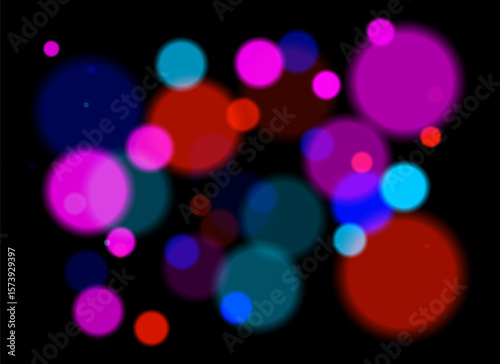 Colorful blurred circles with smooth glow and layered transparency on black background. Random soft shapes form festive abstract depth with no symmetry or focal point.