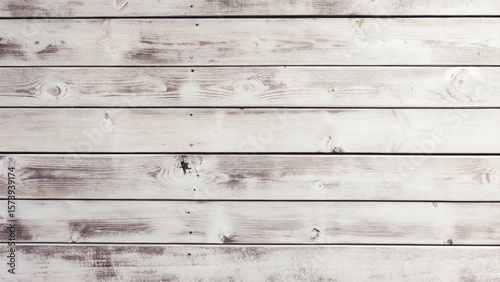 Weathered timber planks show a rich history in this aged wooden texture, perfect for rustic backdrops