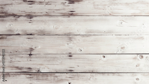 Weathered timber planks show a rich history in this aged wooden texture, perfect for rustic backdrops