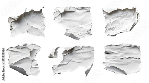 A Collection of Crumpled White Paper Pieces Displaying Various Textures and Shapes in High Resolution