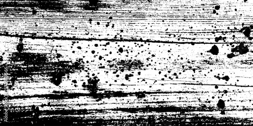 Textured charred wood plank surface with deep burn grooves for grunge background overlay