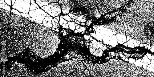 Cracked motor oil slick pattern on wet tarmac for creative design effect