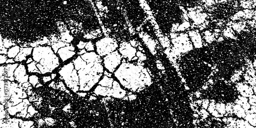 Cracked motor oil slick pattern on wet tarmac texture