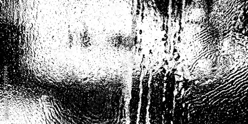 Etched frosted window pane with swirl patterns for textured background and design overlay
