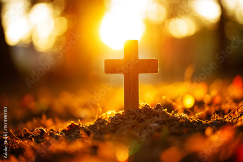 assumption day | Wooden cross bathed in golden sunset light golden hour