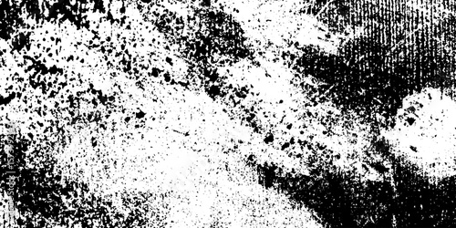 Abstract grunge background with peppered grit and coarse sandpaper texture for design overlay