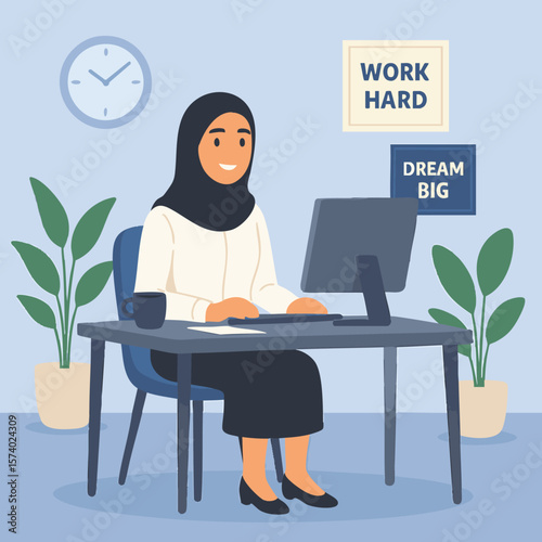Professional Woman in Hijab at Desk