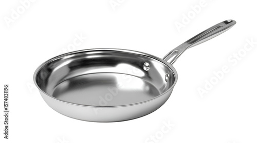 A shiny stainless steel frying pan with a long handle on a black background in a studio shot