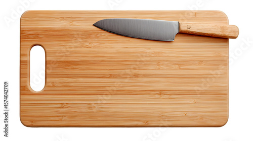 A wooden cutting board with a handle and a knife laying on top of it in a horizontal composition view