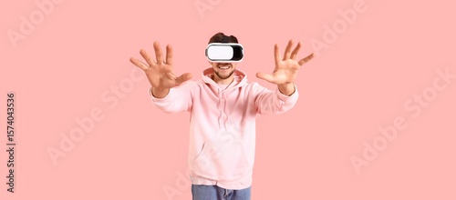 Young bearded man using VR ...