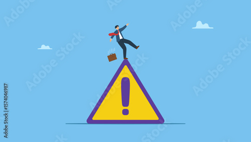 Businessman slip falling on exclamation symbol beware, careful caution sign. Symbolizes mistake caution, business risk or problem warning, failure prevention or avoid danger.
