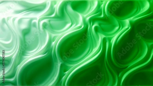 Fluid green swirls create an abstract organic flowing texture