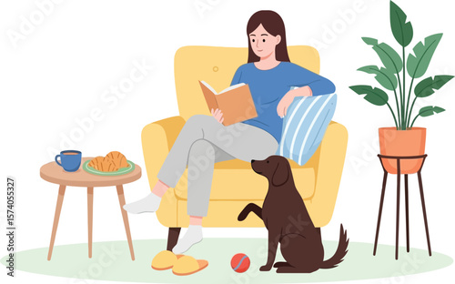 A woman reading a book in a yellow armchair with a dog and breakfast nearby