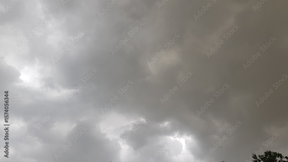 Fototapeta premium Dark Grey Storm Clouds Gathering in an Overcast Sky