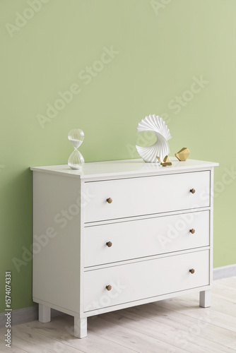White wooden dresser with t...