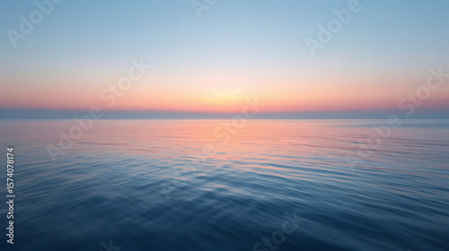 Sunrise over Calm Sea with Peaceful Ocean, and Morning.
