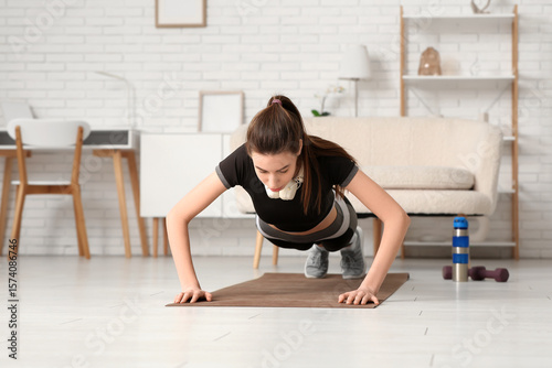 Young sporty woman with hea...