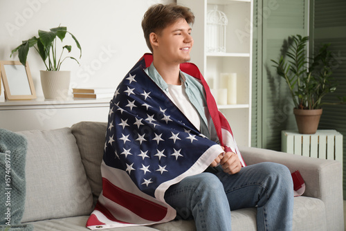 Young man wrapped in americ...