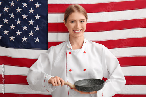 Female chef with frying pan...