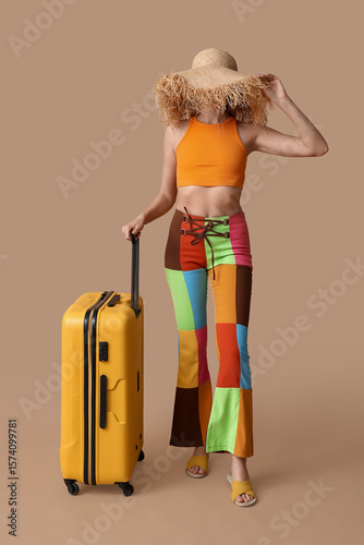Young woman in wicker hat w...