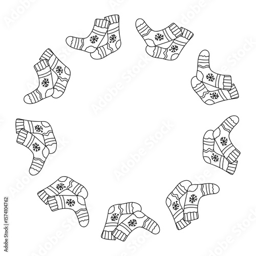 Christmas doodle frame with cozy holiday socks. Vector hand drawn illustration for winter packaging, festive labels, seasonal decor and warm gift designs isolated on white with copy space