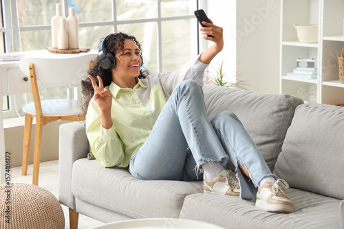 Happy young woman relaxing ...