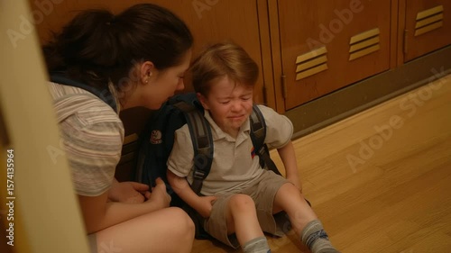 Morning Chaos Child Crying on Floor with Mom in Hallway