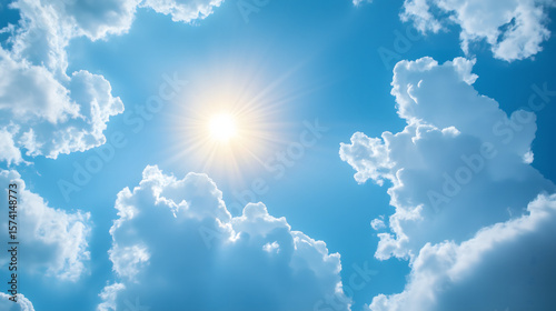 Wallpaper Mural Bright sun shining through fluffy clouds in a clear blue sky. Torontodigital.ca