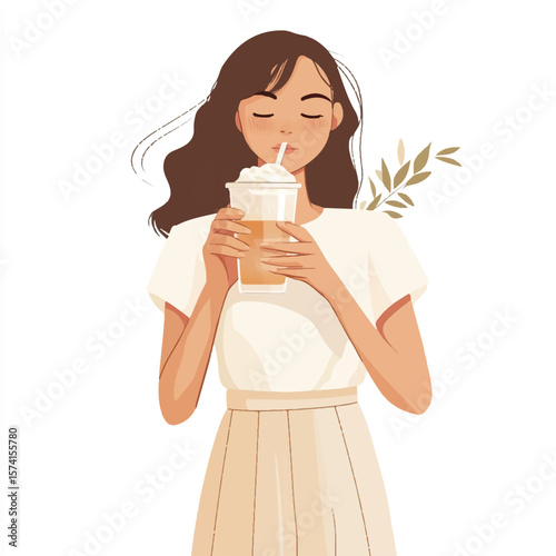 a girl holding a glass of iced latte