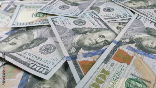 A Cash Pile Comprising U.S. Dollar Bills in a Variety of Different Denominations Available