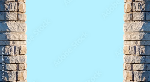 A solitary ancient stone pillar stands in stillness over a pastel blue backdrop, echoing history, mystery, and sacred design.